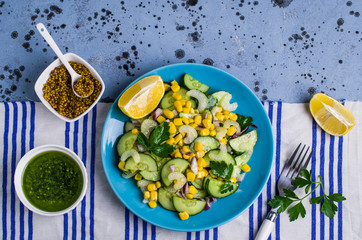 Fototapeta na wymiar Salad with raw vegetables