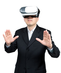 Close up of businessman in a formal wear and virtual reality glasses.