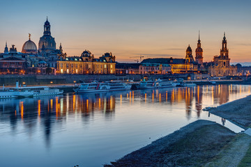 The old town of Dresden with the river Elbe after sunset