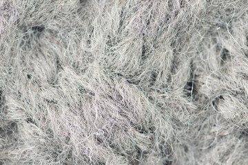 Gray wool knitted background.
