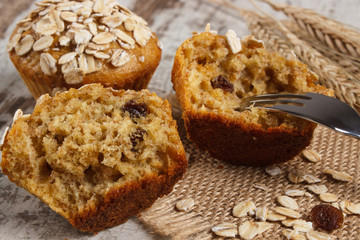 Fresh muffins with oatmeal baked with wholemeal flour, delicious healthy dessert