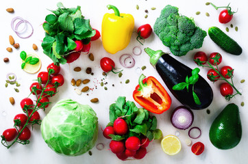Set of fresh vegetables on a white background. Aromatic herbs, onion, avocado, broccoli, pepper bell, eggplant, cabbage, radish, cucumber, almonds, rucola, baby corn. Banner
