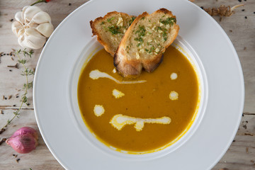 Pumpkin and carrot soup with bread