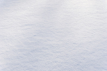 White clean shiny snow background texture, fresh snow texture, snowy surface closeup
