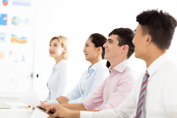 business man with colleagues in meeting room.