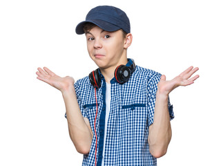 Modern teenager enjoys the music in headphones. Youth culture. Handsome young boy with cap isolated on white background and smiling. 