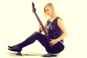 Fototapeta premium Woman with electrical guitar and vinyl record.