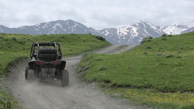 Enduro journey with Buggy car high in the Caucasian high mountains