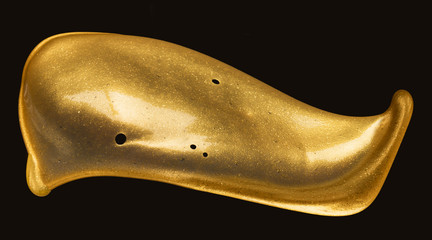 splendid golden splash over black background