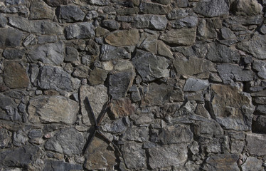 Old stone wall with enforcement