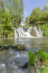 Fototapeta na wymiar Dzhurin waterfall, near Chervonograd in Ukraine