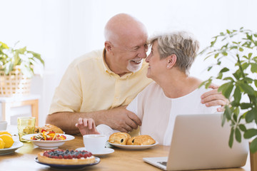 Lovely elderly couple hugging