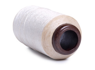 Big thread spools on white background
