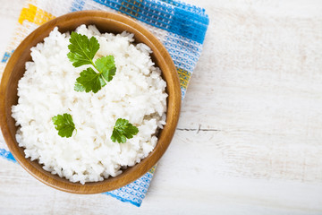 Boiled rice in a wooden bowl