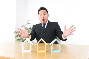 Man being surprised at real estate