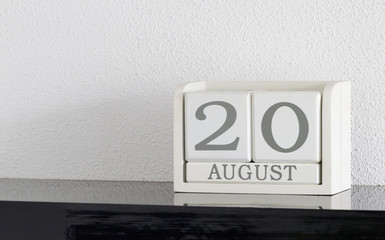 White block calendar present date 20 and month August