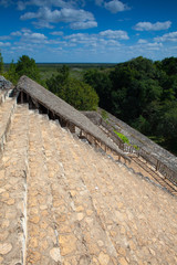 Fototapeta premium Very steep stairs in majestic ruins in Ek Balam. Yucatán, Mexico.