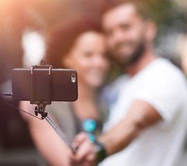 Happy traveling couple making selfie, romantic mood.