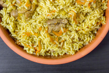 Pilaf with beef, carrots, onions, garlic, pepper and cumin. A traditional dish of Asian cuisine.