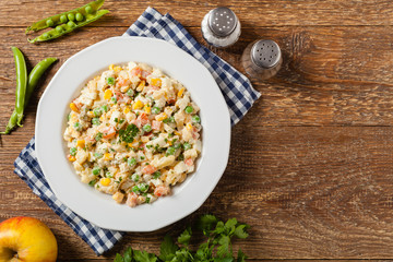 Traditional salad with cooked vegetables with mayonnaise.