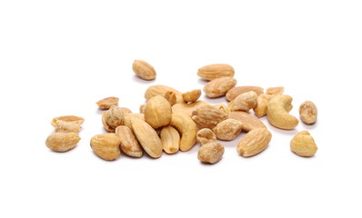 Fototapeta na wymiar Mix of roasted, salted peanuts, cashew nuts and almonds isolated on white background