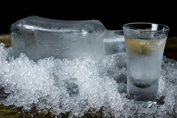 Obraz na płótnie Canvas Vodka in shot glasses