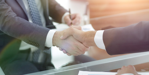 Fototapeta na wymiar welcome and handshake business partners
