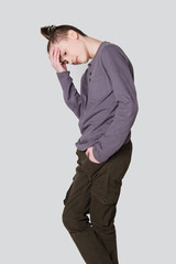 emotional portrait  teen boy  in casual clothes on white background