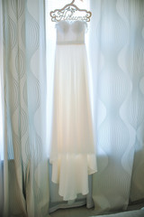 white wedding dress on a light background