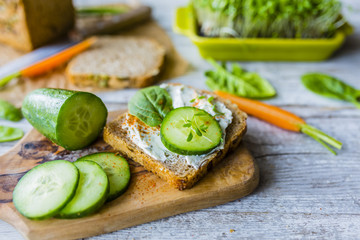 Delicious and healthy sandwich with cream cheese and fresh cucumber.
