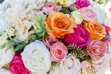 Decorations wedding bouquet of artificial flowers roses and eustoma.