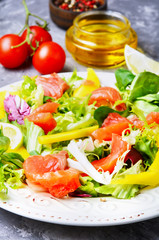 Fish salad with salmon and vegetables