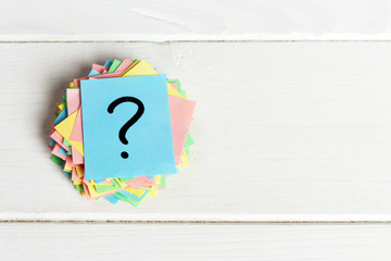 colorful question marks written reminders tickets. ask or business concept