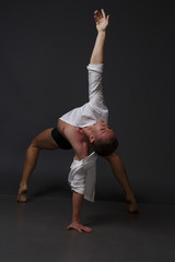 Naklejka premium men is dances in a black pants