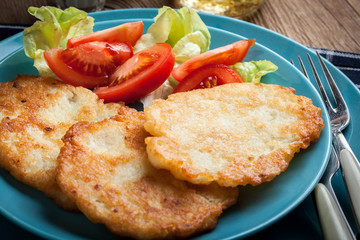 Crispy fried homemade potato pancakes.