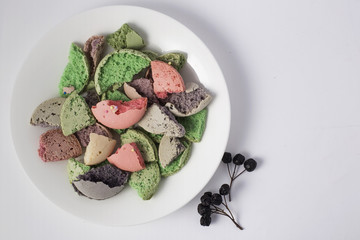 Crumbed Macaroons on white background