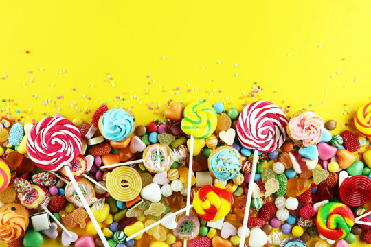 candies with jelly and sugar. colorful array of different childs sweets and treats.