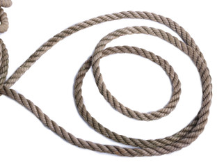 Old coil of rope on a white background