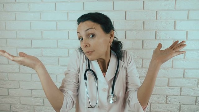 The doctor is justified. The doctor is justified. Woman doctor shows hardness of excuse.