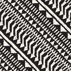 Seamless ethnic and tribal pattern. Hand drawn ornamental stripes. Black and white print for your textiles. Vector background.