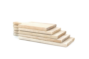 Set of used brown wooden cutting boards stack on each other isolated on white background