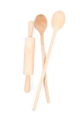 Big wooden stirring spoon and small rolling pin isolated on white background. Kitchen and cooking accessory