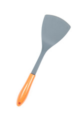 Grey plastic kitchen spatula with orange handle isolated on white background, surface. Kitchen accessory.