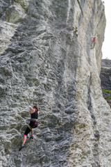 Fototapeta premium People climbing on the rock at Engelberg on Switzerland
