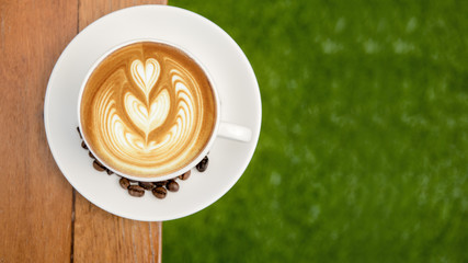 White cup of coffee latte art