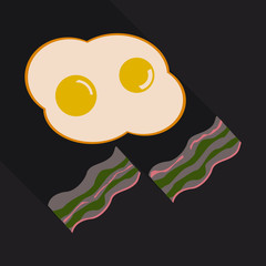 Fried eggs and slices of crisp bacon