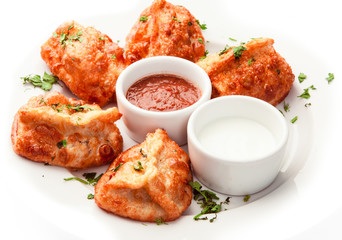 Meat dumplings with sauces