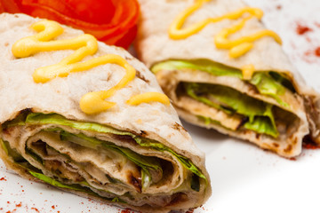 Rolls from pita bread stuffed with salad