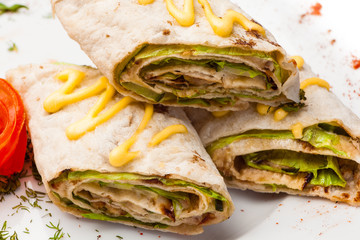 Rolls from pita bread stuffed with salad