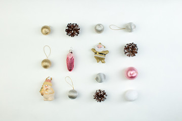 Christmas composition. Gift, christmas decoration, pine cones. Flat lay, top view.